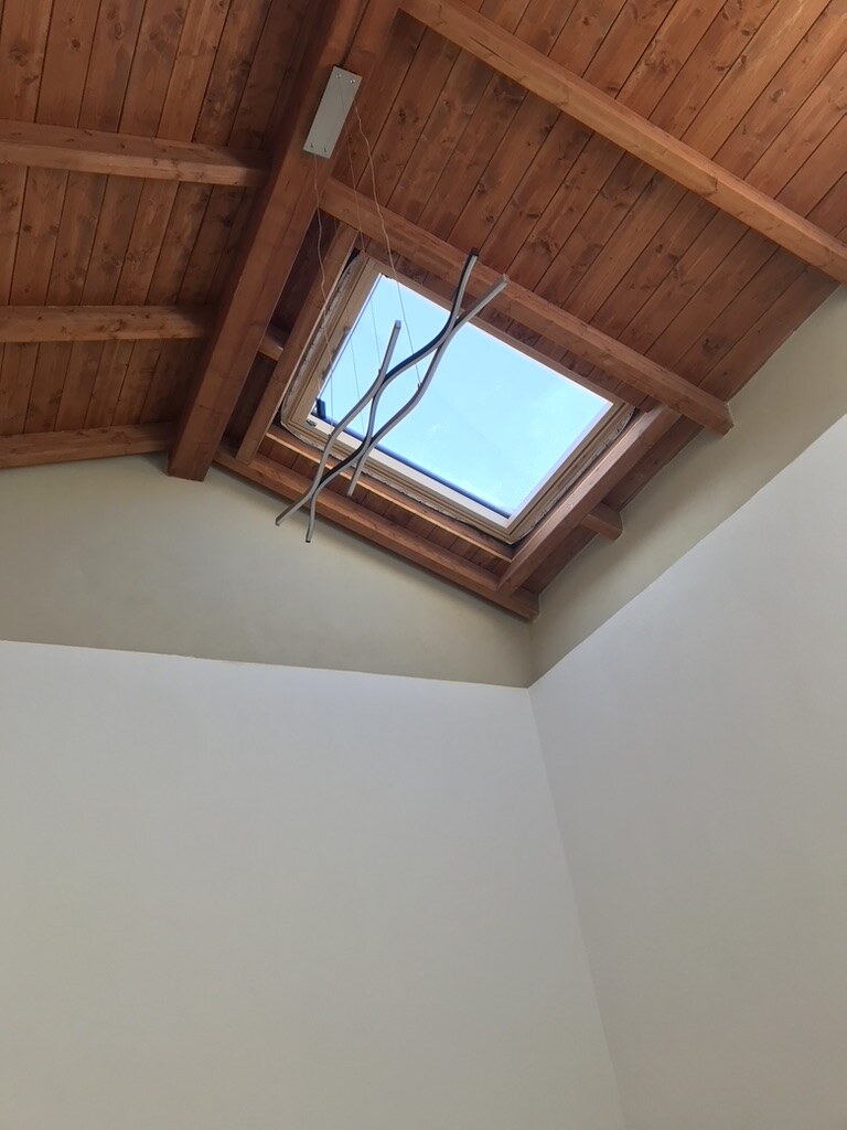 Casa a corte — lucernario interno